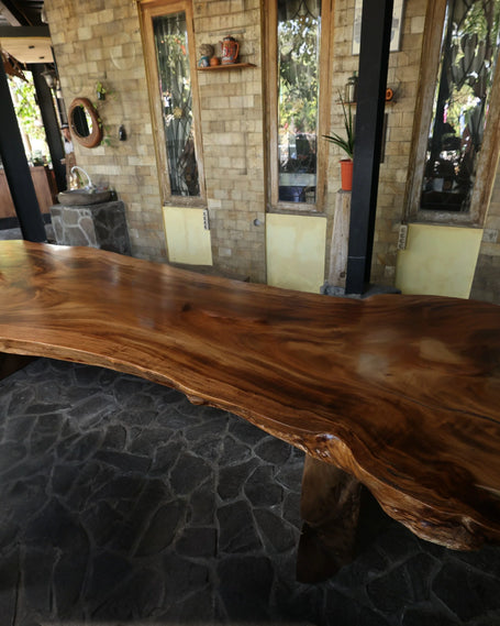 Bespoke modern organic luxury furniture collection: Grand single-slab live edge teak wood statement dining table by Senja Living.