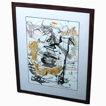 Naga (2024), a one-of-a-kind gestural abstraction painting on paper by the talented young emerging Balinese artist Ni Nyoman Aura Komala Dewi, shown in its dark wood frame and white mat from an angled perspective — photographed and curated by Senja Living.