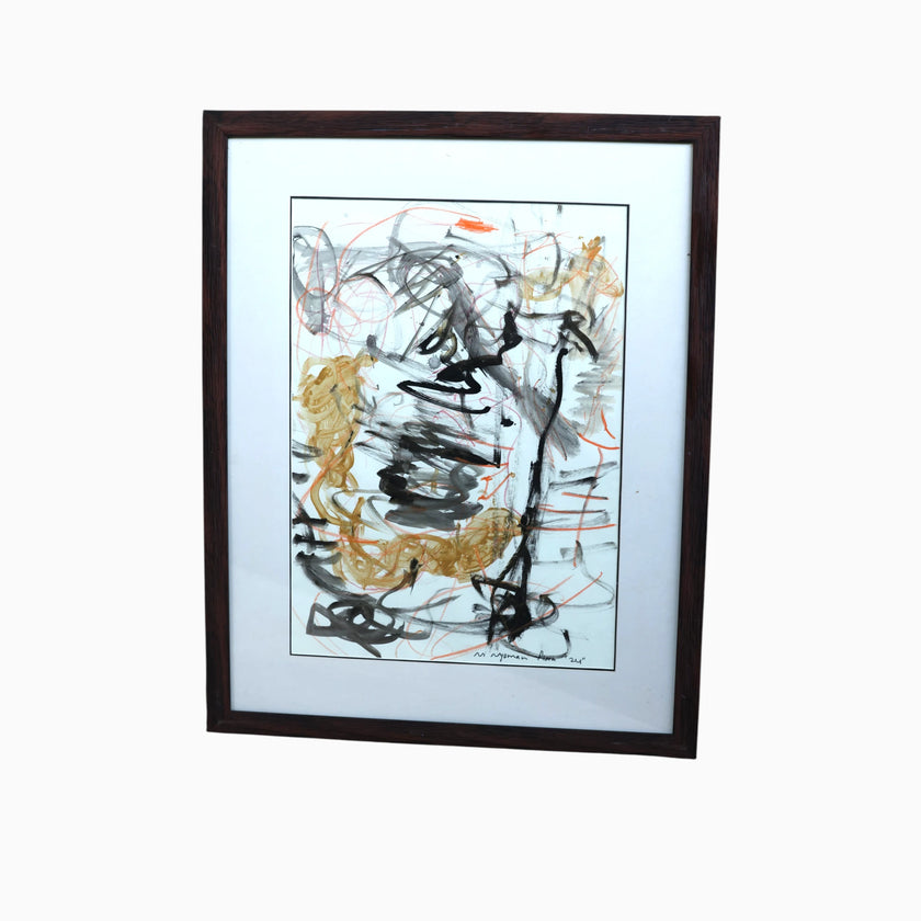 Naga (2024), a one-of-a-kind acrylic painting on paper by the talented young emerging Balinese artist Ni Nyoman Aura Komala Dewi, shown in its dark wood frame and white mat against a clean white background, revealing the complete gestural composition in black, charcoal grey, ochre and vermilion — photographed and curated by Senja Living.
