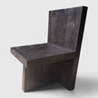 Side profile view of the Bespoke Butterfly Joint Fire-Charred Chair designed from premium teak wood planks highlighting its bold geometric brutalist form from Senja Living.
