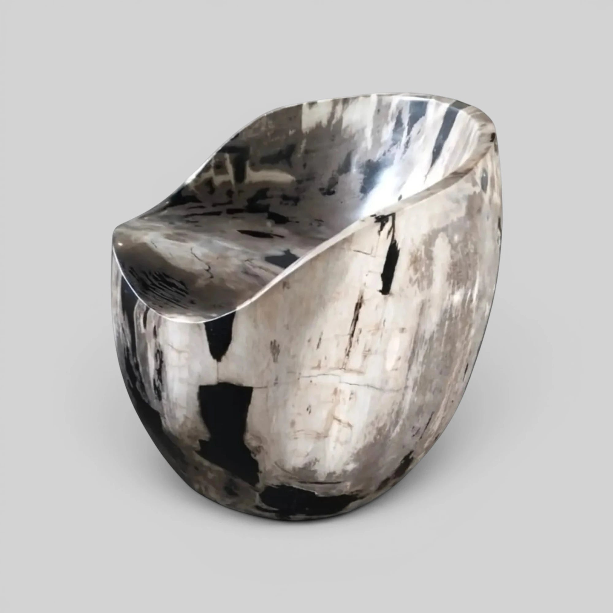 Black and White Crystalline Petrified Wood Accent Chair featuring a hand-carved scooped seat from Senja Living.
