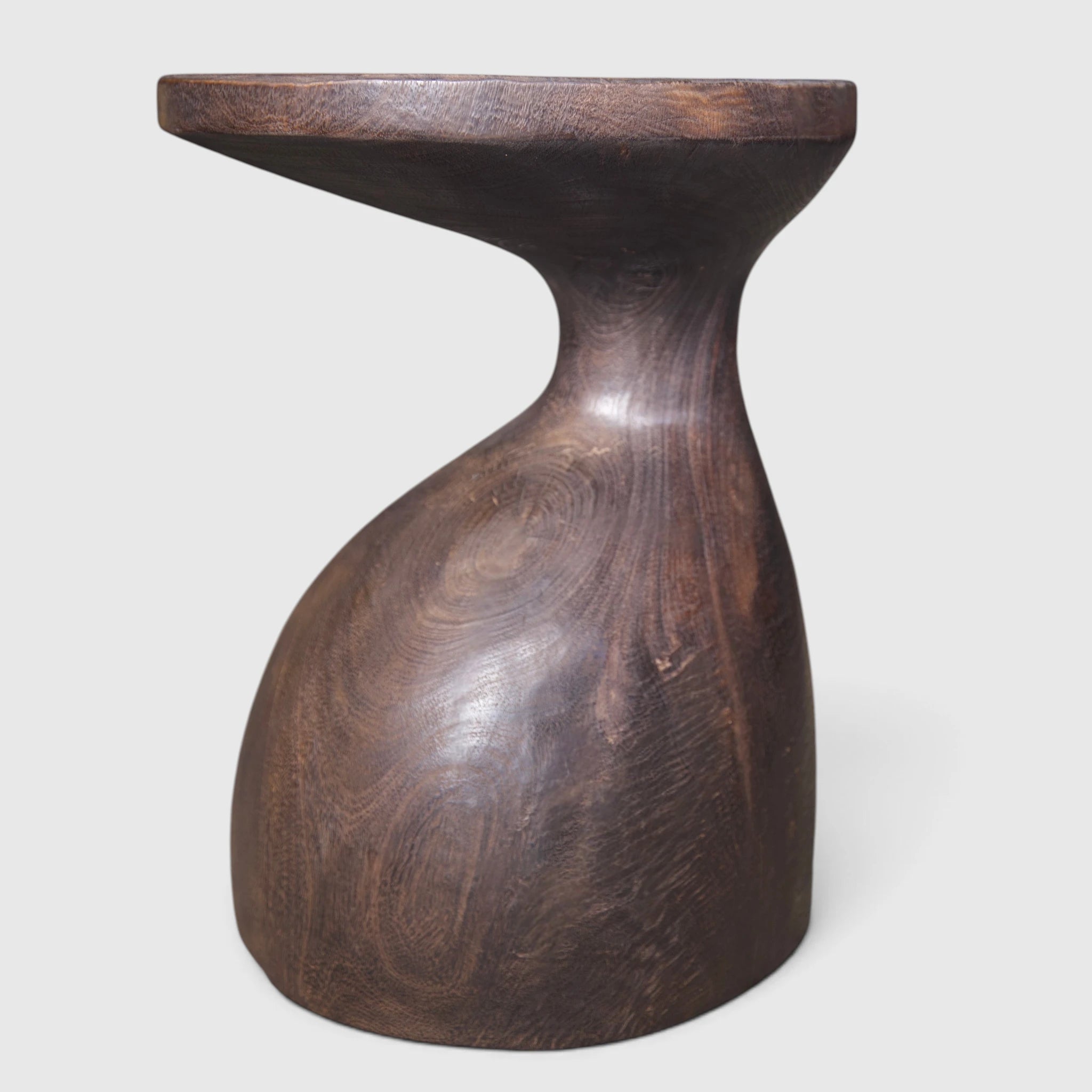 An engaging side view of the Sculptural Gooseneck Espresso Side Table from Senja Living.