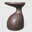 An engaging side view of the Sculptural Gooseneck Espresso Side Table from Senja Living.