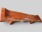 An elevated aerial back view of the Sculptural Live Edge Bench by Senja Living, highlighting the rugged textured live edge and the beautifully polished interior seating surface.