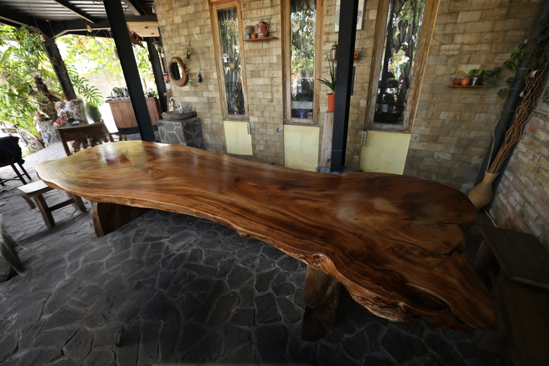 Modern Organic Luxury Furniture: Grand single-slab live-edge teak wood statement dining table by Senja Living.