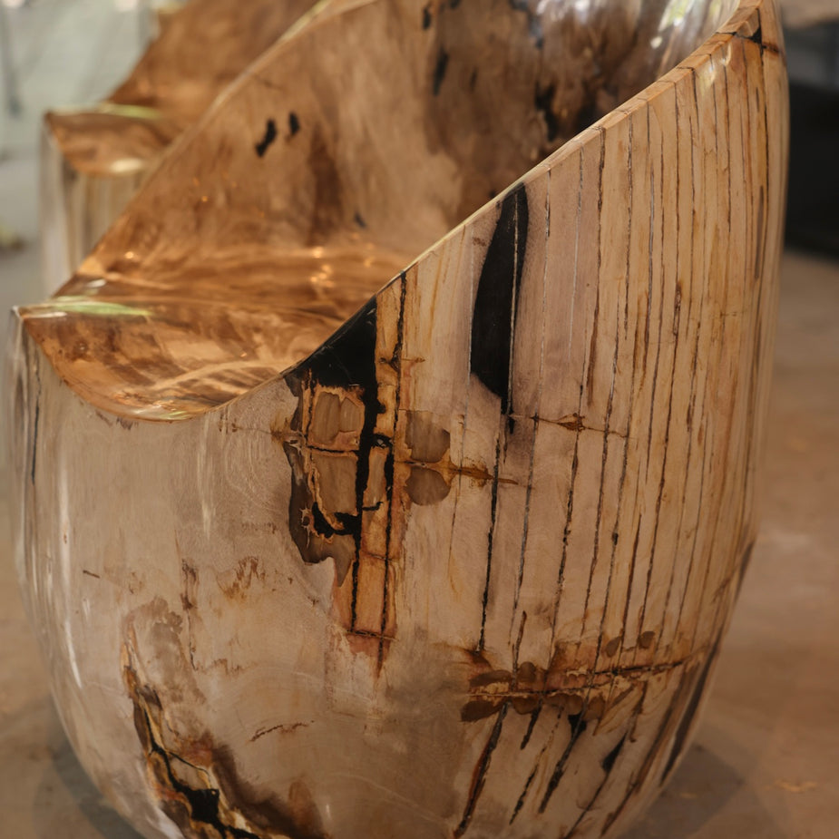 Bespoke modern organic statement furniture: Honey Amber Petrified Wood Accent Chair by Senja Living.